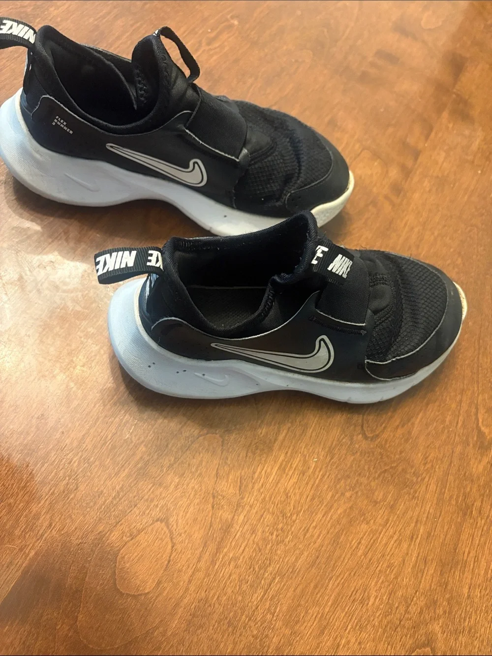 Nike Kids Black and White Slip-On Athletic Sneakers